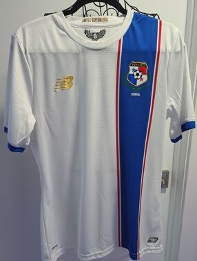 New Balance White Jersey with Blue and Red Center Stripe